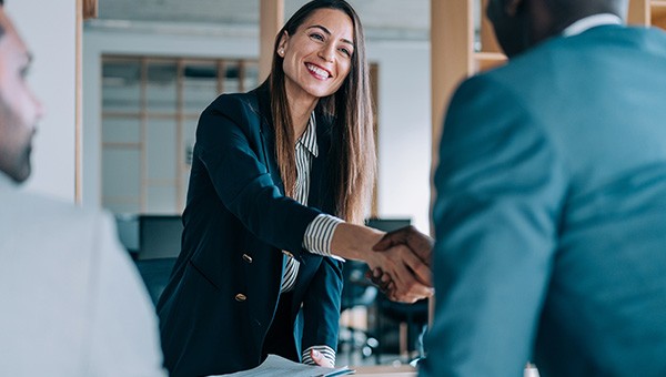 Professional Liability: Business meeting people shaking hands